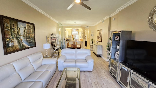 9587 Weldon Cir Unit B414, Tamarac, FL 33321 - living room featuring a ceiling fan, light wood-style floors, ornamental molding, and baseboards