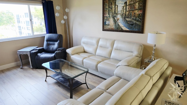9587 Weldon Cir Unit B414, Tamarac, FL 33321 - living area with baseboards and wood finished floors