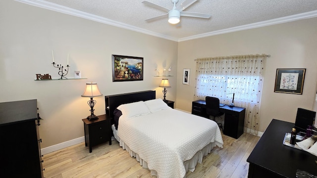 9587 Weldon Cir Unit B414, Tamarac, FL 33321 - bedroom with light wood-style floors, crown molding, a desk, a textured ceiling, and baseboards