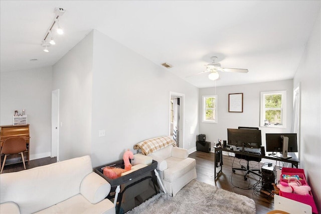 1117 Gopher Ridge Rd, Fort Pierce, FL 34982 - office space featuring wood finished floors, a ceiling fan, rail lighting, and baseboards