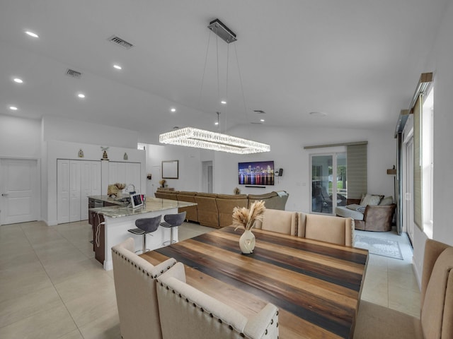 16430 71st Ln N, Loxahatchee, FL 33470 - dining area with light tile patterned flooring, recessed lighting, and high vaulted ceiling