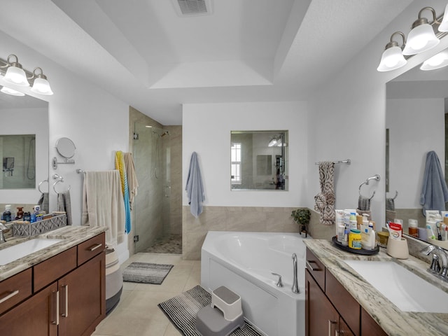 16430 71st Ln N, Loxahatchee, FL 33470 - full bath with a stall shower, tile patterned flooring, a bath, and two vanities