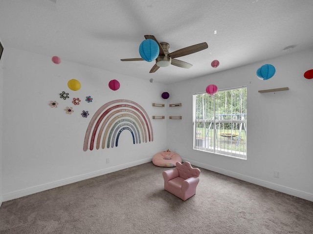 16430 71st Ln N, Loxahatchee, FL 33470 - unfurnished room featuring baseboards, carpet floors, and a ceiling fan