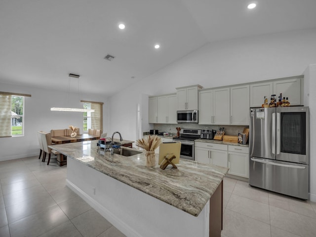 16430 71st Ln N, Loxahatchee, FL 33470 - kitchen with appliances with stainless steel finishes, a sink, backsplash, light tile patterned floors, and recessed lighting