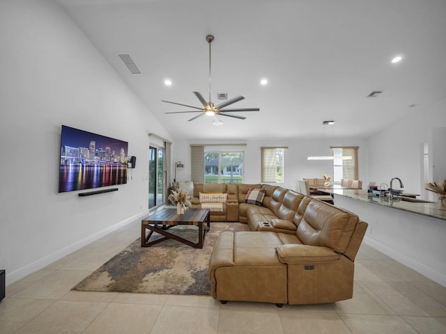 16430 71st Ln N, Loxahatchee, FL 33470 - living area with lofted ceiling, light tile patterned floors, baseboards, recessed lighting, and a ceiling fan