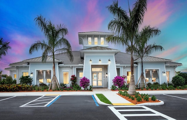1223 Harper Way Unit 9, Vero Beach, FL 32960 - view of building exterior with uncovered parking