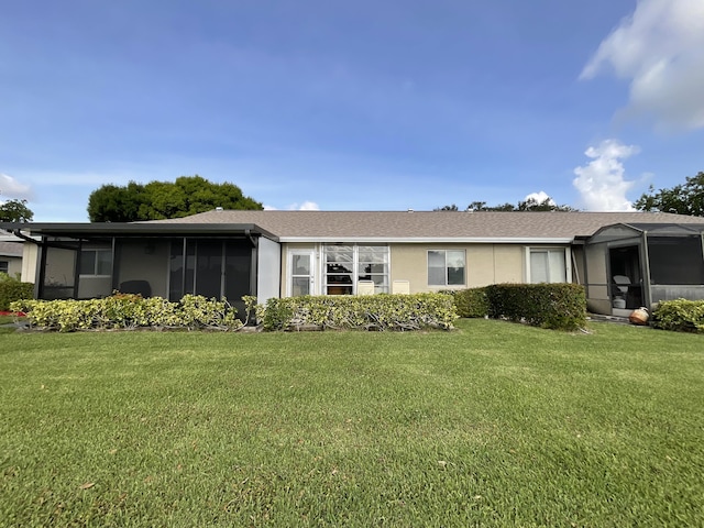 18856 Argosy Dr Unit C, Boca Raton, FL 33496 - ranch-style home featuring a sunroom and a front lawn