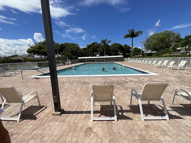 18856 Argosy Dr Unit C, Boca Raton, FL 33496 - community pool with a patio area