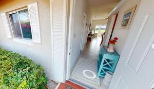 18856 Argosy Dr Unit C, Boca Raton, FL 33496 - doorway to property featuring stucco siding