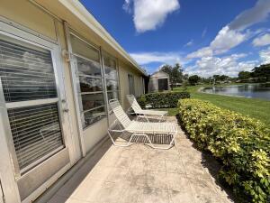 18856 Argosy Dr Unit C, Boca Raton, FL 33496 - view of patio with a water view