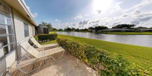 18856 Argosy Dr Unit C, Boca Raton, FL 33496 - view of patio with a water view