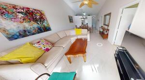 18856 Argosy Dr Unit C, Boca Raton, FL 33496 - living room with a ceiling fan and vaulted ceiling