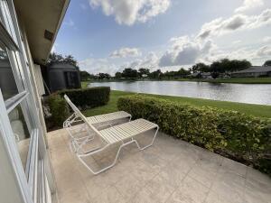18856 Argosy Dr Unit C, Boca Raton, FL 33496 - view of patio with a water view