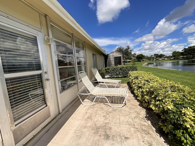 18856 Argosy Dr Unit C, Boca Raton, FL 33496 - view of patio featuring a water view