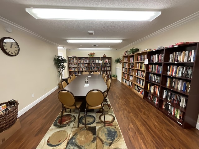 18856 Argosy Dr Unit C, Boca Raton, FL 33496 - dining area with ornamental molding, a textured ceiling, and wood finished floors
