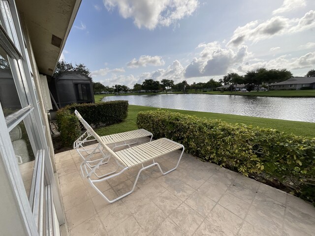 18856 Argosy Dr Unit C, Boca Raton, FL 33496 - view of patio / terrace with a water view