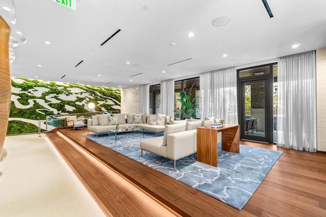 220 SE Mizner Blvd Unit 611, Boca Raton, FL 33432 - living room featuring wood finished floors and recessed lighting