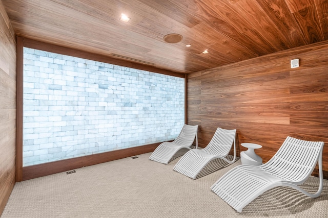 220 SE Mizner Blvd Unit 611, Boca Raton, FL 33432 - sitting room featuring wooden ceiling, carpet, wooden walls, and recessed lighting