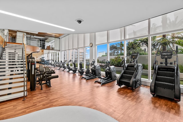 220 SE Mizner Blvd Unit 611, Boca Raton, FL 33432 - gym with wood finished floors and a wall of windows