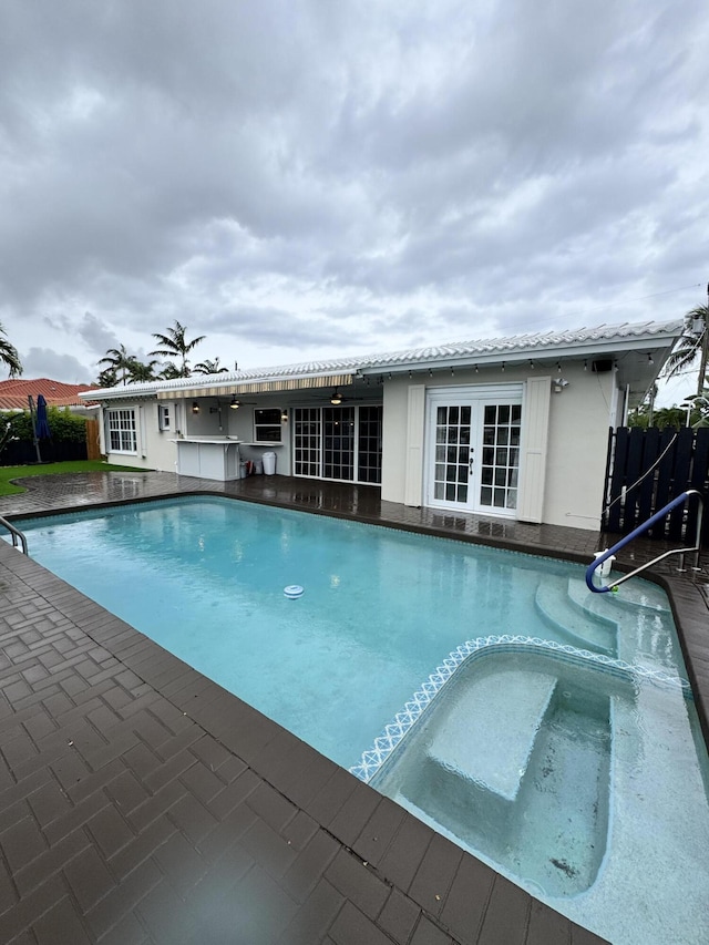 391 SE 15th Ave, Pompano Beach, FL 33060 - view of pool featuring french doors and a patio area