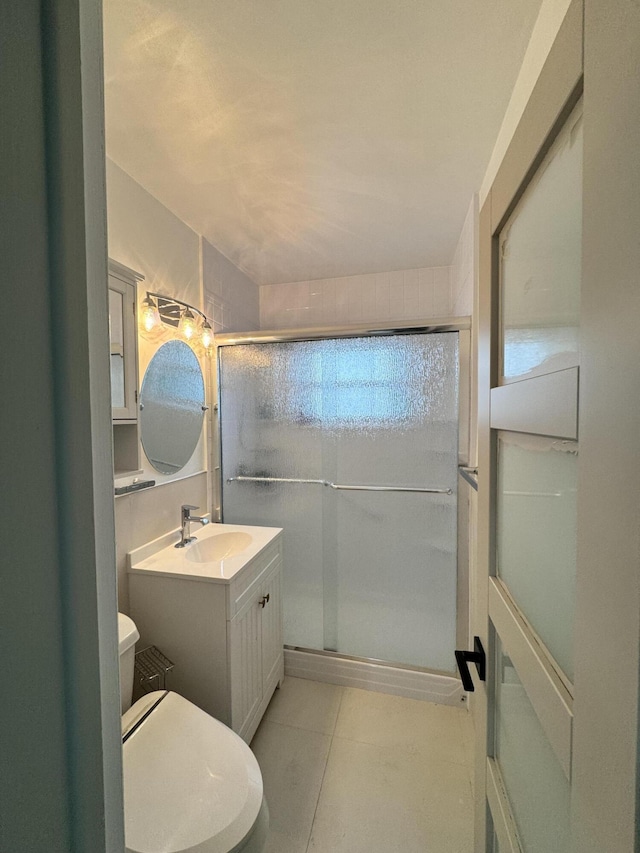 391 SE 15th Ave, Pompano Beach, FL 33060 - bathroom featuring toilet, a shower stall, and vanity