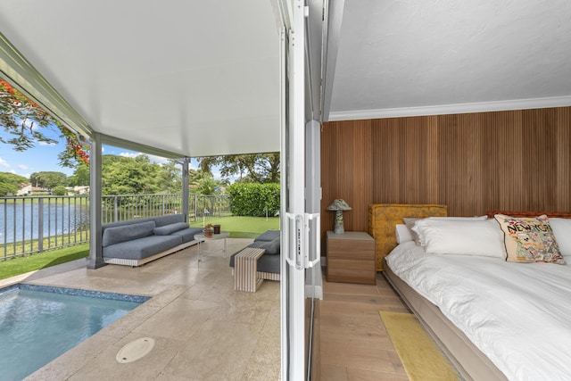 2407 SW 23rd Cranbrook Dr, Boynton Beach, FL 33436 - bedroom featuring a water view, access to exterior, and wooden walls