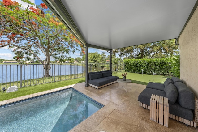 2407 SW 23rd Cranbrook Dr, Boynton Beach, FL 33436 - view of swimming pool with a putting area, a water view, a patio, and a fenced backyard