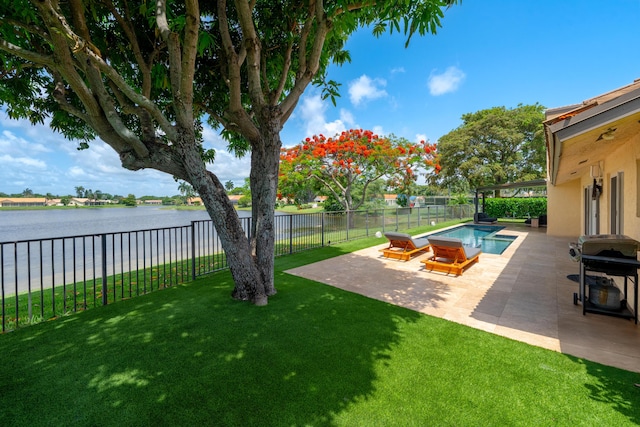 2407 SW 23rd Cranbrook Dr, Boynton Beach, FL 33436 - view of yard featuring a water view and a patio