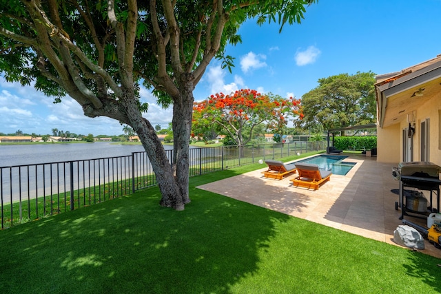 2407 SW 23rd Cranbrook Dr, Boynton Beach, FL 33436 - view of yard featuring a water view and a patio
