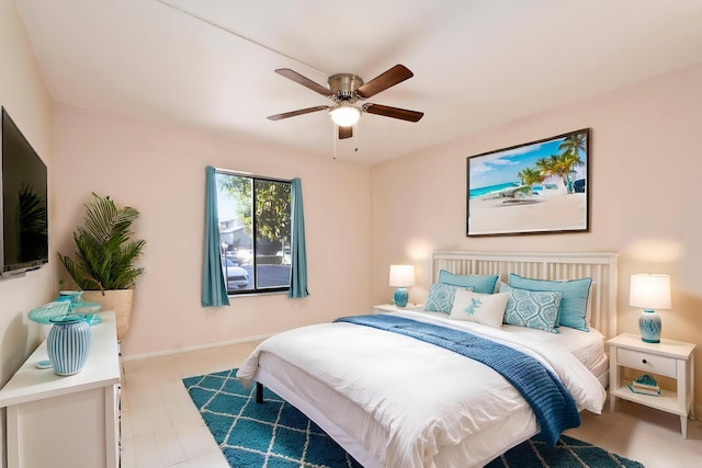 800 NW Fork Rd Unit 9-1, Stuart, FL 34994 - bedroom featuring baseboards and ceiling fan