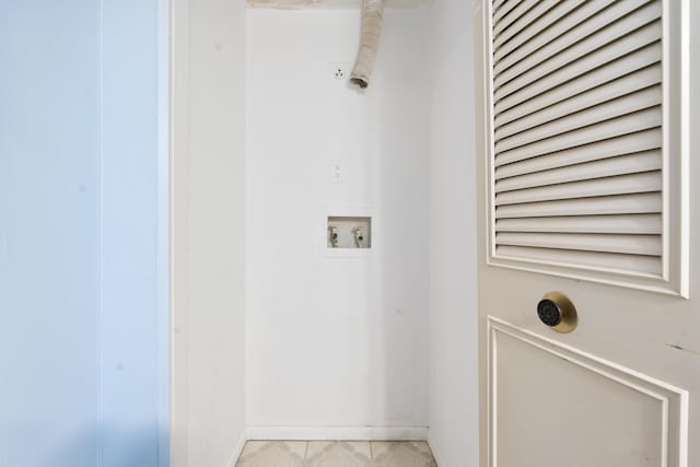800 NW Fork Rd Unit 9-1, Stuart, FL 34994 - laundry room featuring baseboards and washer hookup