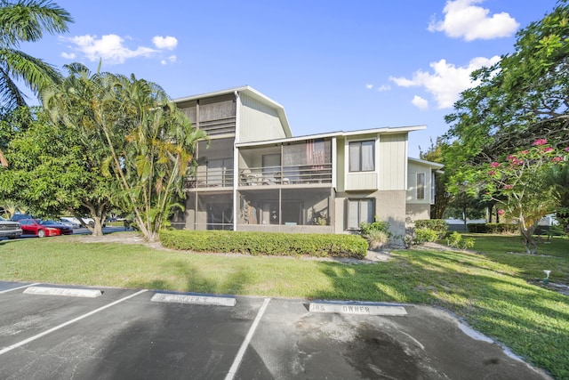 800 NW Fork Rd Unit 9-1, Stuart, FL 34994 - view of building exterior with uncovered parking