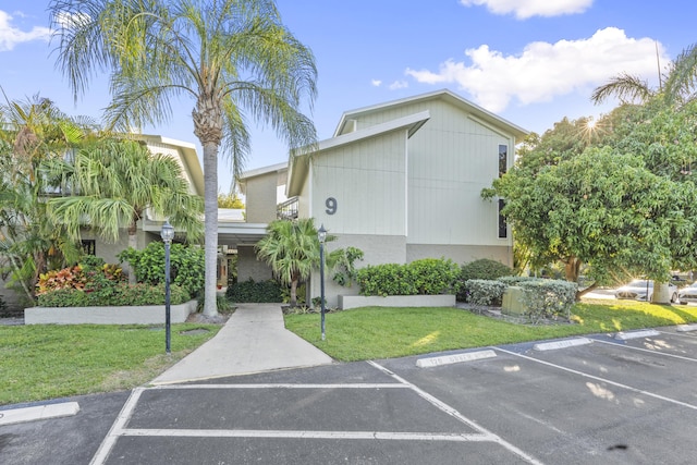 800 NW Fork Rd Unit 9-1, Stuart, FL 34994 - view of property featuring uncovered parking