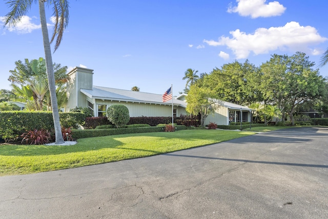 800 NW Fork Rd Unit 9-1, Stuart, FL 34994 - view of front facade with a front lawn