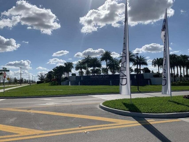 12145 SW Jasper Lake Way, Port Saint Lucie, FL 34987 - view of asphalt road featuring curbs