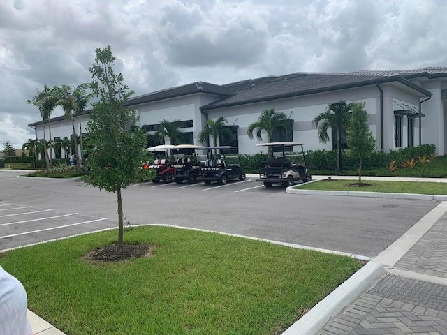 12145 SW Jasper Lake Way, Port Saint Lucie, FL 34987 - view of uncovered parking lot
