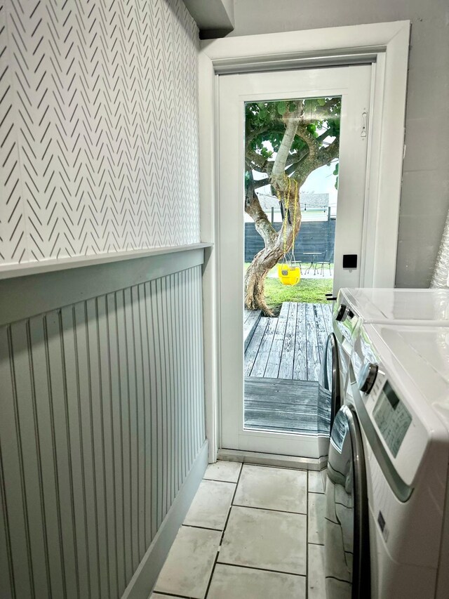 5690 Honeysuckle Dr, West Palm Beach, FL 33415 - washroom featuring washing machine and dryer