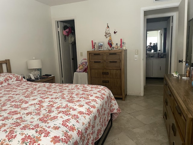 173 Normandy D, Delray Beach, FL 33484 - bedroom featuring light tile patterned floors