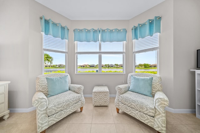 11187 SW Lake Park Dr, Port Saint Lucie, FL 34987 - sitting room with light tile patterned floors and baseboards