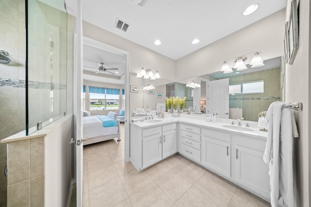 11187 SW Lake Park Dr, Port Saint Lucie, FL 34987 - full bathroom featuring ensuite bathroom, a chandelier, double vanity, a stall shower, and tile patterned floors