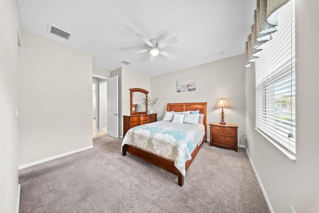 11187 SW Lake Park Dr, Port Saint Lucie, FL 34987 - bedroom with carpet flooring, baseboards, and ceiling fan