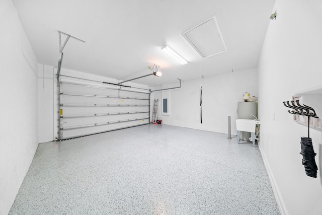 11187 SW Lake Park Dr, Port Saint Lucie, FL 34987 - garage featuring electric panel and a garage door opener