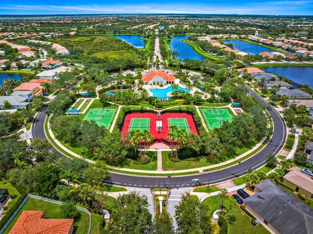11187 SW Lake Park Dr, Port Saint Lucie, FL 34987 - aerial perspective of suburban area with a large body of water and a pool