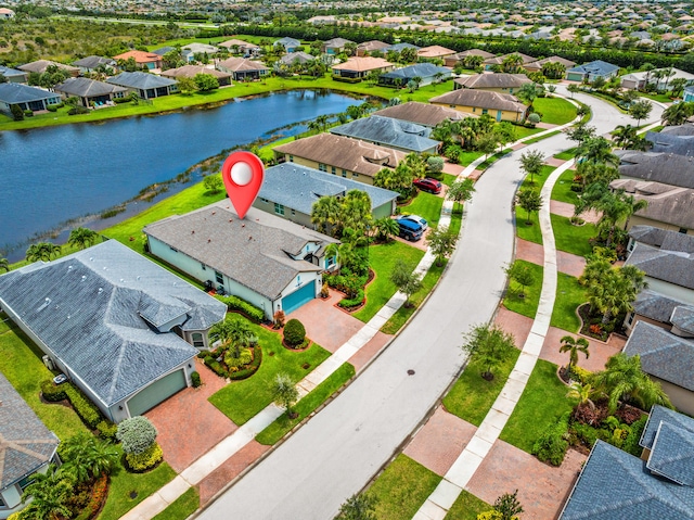 11187 SW Lake Park Dr, Port Saint Lucie, FL 34987 - aerial view of residential area with a large body of water