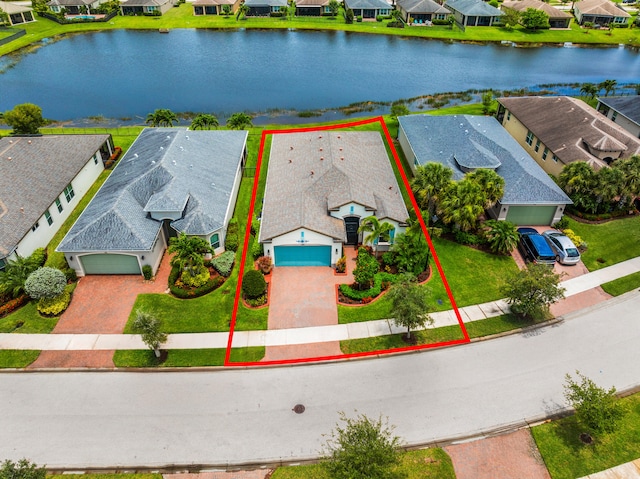 11187 SW Lake Park Dr, Port Saint Lucie, FL 34987 - aerial view of residential area featuring a nearby body of water and property parcel outlined