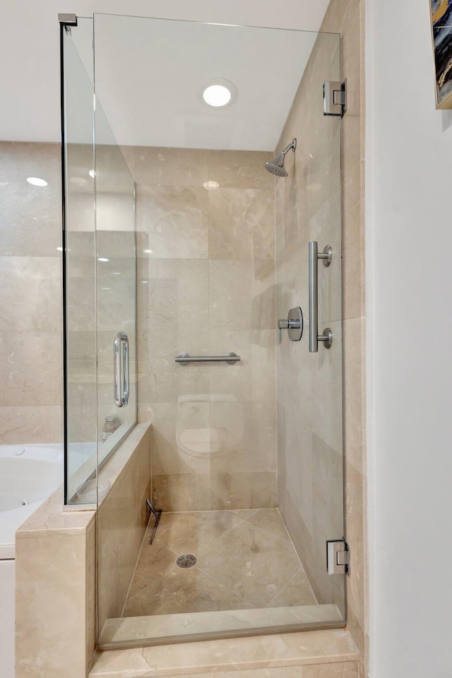 550 Okeechobee Blvd Unit 504, West Palm Beach, FL 33401 - bathroom featuring a shower stall and a bath