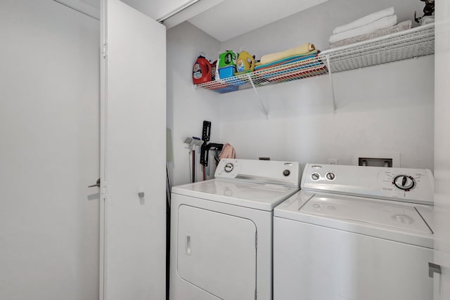 550 Okeechobee Blvd Unit 504, West Palm Beach, FL 33401 - laundry area with washer and clothes dryer