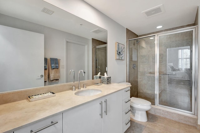 550 Okeechobee Blvd Unit 504, West Palm Beach, FL 33401 - full bathroom featuring vanity, toilet, a shower stall, tile patterned flooring, and recessed lighting