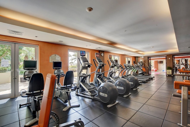 550 Okeechobee Blvd Unit 504, West Palm Beach, FL 33401 - exercise room with plenty of natural light, french doors, and a raised ceiling