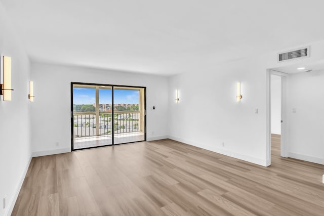 7076 Huntington Ln Unit 206, Delray Beach, FL 33446 - unfurnished room featuring light wood-style flooring
